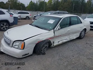 2005 Cadillac DeVille z VIN 1G6KD54Y75U162964, wystawiony jako IAAI lot #40794096 z przebiegiem 165 341 mil mil oraz . Historia ofert i sprzedaży dostępna na DreamBid. Obrazek 2.