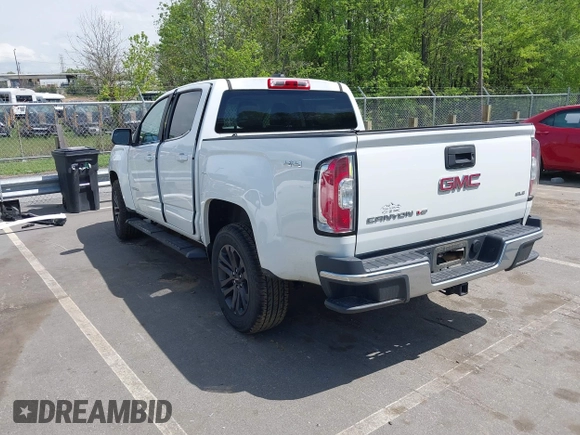 2019 GMC Canyon 4WD SLE z VIN 1GTG6CENXK1319647, wystawiony jako IAAI lot #42039568 z przebiegiem 56 371 mil mil oraz . Historia ofert i sprzedaży dostępna na DreamBid. Obrazek 3.