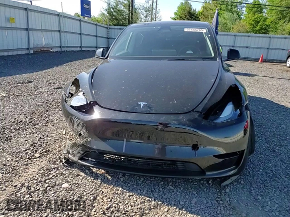 2023 Tesla Model Y Long Range z VIN 7SAYGDEE1PF865195, wystawiony jako Copart lot #57455765 z przebiegiem 32 011 mil mil oraz Szkoda całkowita • Salvage title. Historia ofert i sprzedaży dostępna na DreamBid. Obrazek 14.