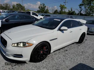 2015 Jaguar XJ with VIN SAJWA1CZ8F8V81637, listed as a Copart auction lot 55619555 with 88,328 mi miles and Salvage Title. Bid and sale history available at DreamBid. Image 1.