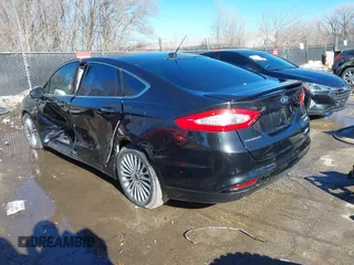 2013 Ford Fusion Titanium Hybrid with VIN 3FA6P0RU5DR339716, listed as a IAAI auction lot 41405835 with 197,840 mi miles. Bid and sale history available at carsss.com. Image 3.
