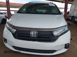 2021 Honda Odyssey Touring z VIN 5FNRL6H85MB034888, wystawiony jako IAAI lot #42386984 z przebiegiem 40 514 mil mil oraz . Historia ofert i sprzedaży dostępna na DreamBid. Obrazek 12.