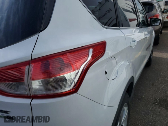2013 Ford Escape SE z VIN 1FMCU9G93DUD04038, wystawiony jako IAAI lot #42587629 z przebiegiem 213 211 mil mil oraz . Historia ofert i sprzedaży dostępna na DreamBid. Obrazek 21.