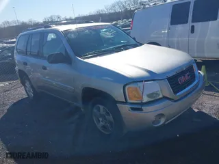 2004 GMC Envoy SLE with VIN 1GKDS13S942364463, listed as a IAAI auction lot 41658640 with 257,138 mi miles. Bid and sale history available at carsss.com. Image 1.