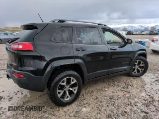 2014 Jeep Cherokee Trailhawk with VIN 1C4PJMBS1EW211570, listed as a Copart auction lot 51465845 with 156,320 mi miles and Salvage Title. Bid and sale history available at carsss.com. Image 3.