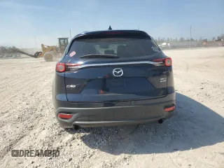 2016 Mazda CX-9 Touring z VIN JM3TCACY8G0117354, wystawiony jako Copart lot #56660935 z przebiegiem 112 365 mil mil oraz Szkoda całkowita • Salvage title. Historia ofert i sprzedaży dostępna na DreamBid. Obrazek 6.