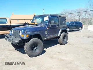 2003 Jeep Wrangler Sport with VIN 1J4FA49S03P343285, listed as a IAAI auction lot 41823684 with 201,723 mi miles and . Bid and sale history available at DreamBid. Image 18.