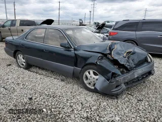 1995 Lexus ES 300 with VIN JT8GK13T8S0087491, listed as a Copart auction lot 49961255 with 188,377 mi miles and Salvage Title. Bid and sale history available at DreamBid. Image 4.