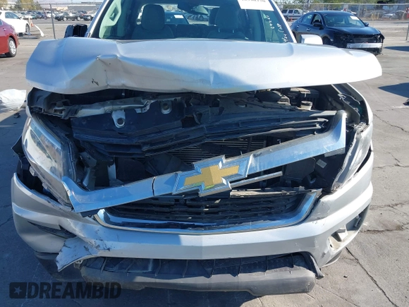 2020 Chevrolet Colorado 2WD Work Truck with VIN 1GCGSBEN0L1209889, listed as a IAAI auction lot 40390370 with 67,417 mi miles and . Bid and sale history available at DreamBid. Image 6.