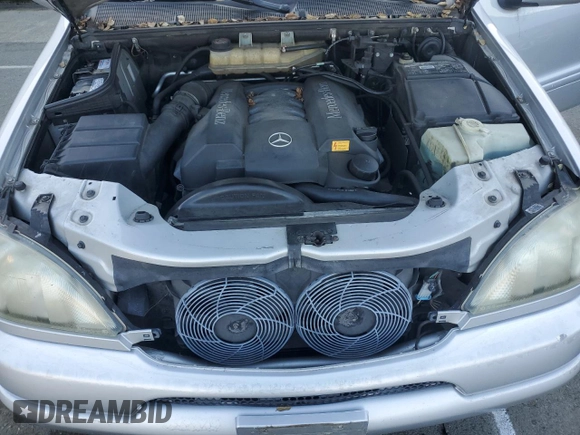 2000 Mercedes-Benz M 320/430/500 with VIN 4JGAB72E0YA167962, listed as a Copart auction lot 89158575 with 194,471 mi miles and Salvage title. Bid and sale history available at DreamBid. Image 12.