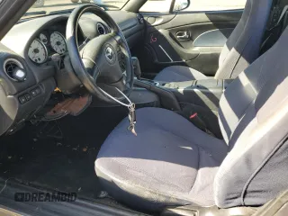 2003 Mazda MX-5 Miata Cloth with VIN JM1NB353430308653, listed as a Copart auction lot 53129865 with 144,549 mi miles and Salvage Title. Bid and sale history available at DreamBid. Image 7.