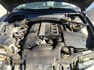 2004 BMW 3 Series 325Ci with VIN WBABW33474PL29697, listed as a IAAI auction lot 41718697 with 151,815 mi miles. Bid and sale history available at carsss.com. Image 10.