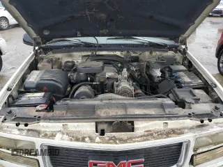 1997 GMC Suburban z VIN 1GKGK26JXVJ715765, wystawiony jako Copart lot #73188284 z przebiegiem 301 101 mil mil oraz Szkoda całkowita • Salvage title. Historia ofert i sprzedaży dostępna na DreamBid. Obrazek 12.