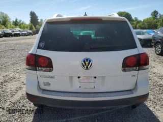 2008 Volkswagen Touareg V6 z VIN WVGBE77L68D012544, wystawiony jako Copart lot #58716985 z przebiegiem 148 637 mil mil oraz Czysty tytuł • Clean title. Historia ofert i sprzedaży dostępna na DreamBid. Obrazek 6.