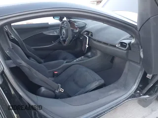 2023 McLaren Artura z VIN SBM16AEA4PW001449, wystawiony jako IAAI lot #41347791 z przebiegiem 4703 mil mil oraz . Historia ofert i sprzedaży dostępna na DreamBid. Obrazek 5.