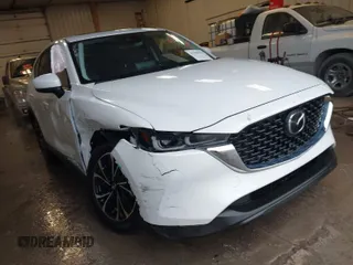 2023 Mazda CX-5 2.5 S Premium Plus Package with VIN JM3KFBEM5P0258952, listed as a IAAI auction lot 41509174 with 24,712 mi miles. Bid and sale history available at carsss.com. Image 1.