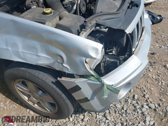2006 Jeep Grand Cherokee Laredo with VIN 1J4GS48K56C260532, listed as a IAAI auction lot 42607110 with 153,110 mi miles and . Bid and sale history available at DreamBid. Image 6.