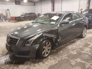 2014 Cadillac ATS Standard AWD z VIN 1G6AG5RX8E0174762, wystawiony jako IAAI lot #42323296 z przebiegiem 107 213 mil mil oraz . Historia ofert i sprzedaży dostępna na DreamBid. Obrazek 2.