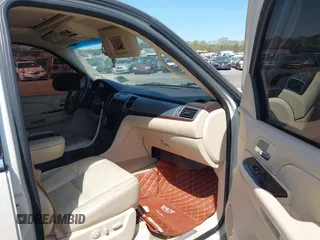 2007 Cadillac Escalade z VIN 1GYFK63857R355240, wystawiony jako IAAI lot #42165120 z przebiegiem Nie podano mil oraz . Historia ofert i sprzedaży dostępna na DreamBid. Obrazek 5.