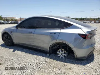 2024 Tesla Model Y Long Range with VIN 7SAYGDEE0RA288420, listed as a Copart auction lot 59159015 with 7,831 mi miles and Salvage title. Bid and sale history available at DreamBid. Image 2.