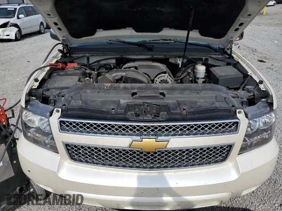 2012 Chevrolet Suburban LTZ with VIN 1GNSKKE7XCR288587, listed as a Copart auction lot 58721725 with 234,900 mi miles and Salvage title. Bid and sale history available at DreamBid. Image 12.