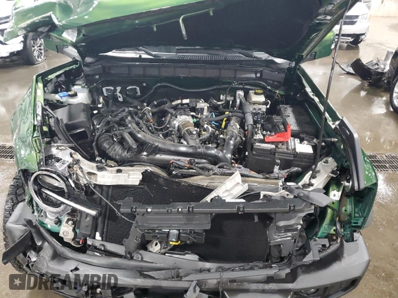 2023 Ford Bronco z VIN 1FMEE5DPXPLB64324, wystawiony jako Copart lot #52914775 z przebiegiem 22 937 mil mil oraz Szkoda całkowita • Salvage title. Historia ofert i sprzedaży dostępna na DreamBid. Obrazek 13.