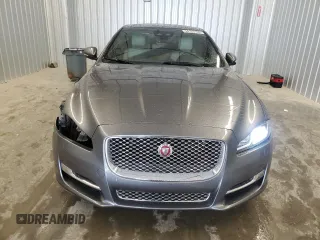 2019 Jaguar XJ Portfolio with VIN SAJWA2G71K8W19797, listed as a Copart auction lot 54133195 with 57,446 mi miles and Salvage Title. Bid and sale history available at DreamBid. Image 5.
