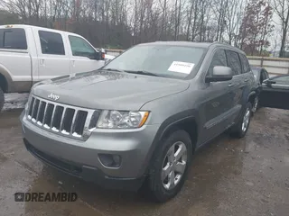 2012 Jeep Grand Cherokee Laredo with VIN 1C4RJFAG0CC156545, listed as a IAAI auction lot 41909296 with 170,033 mi miles. Bid and sale history available at carsss.com. Image 17.