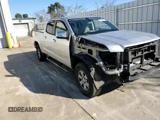 2015 GMC Canyon 2WD with VIN 1GTG5AE38F1156671, listed as a Copart auction lot 85194924 with 123,597 mi miles and Salvage Title. Bid and sale history available at DreamBid. Image 11.