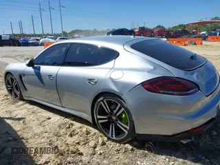 2014 Porsche Panamera S E-Hybrid with VIN WP0AD2A75EL044663, listed as a IAAI auction lot 41818381 with 44,194 mi miles and . Bid and sale history available at DreamBid. Image 14.