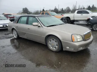 2004 Cadillac DeVille DTS z VIN 1G6KF57944U117834, wystawiony jako Copart lot #89320975 z przebiegiem 149 820 mil mil oraz Szkody całkowita. Historia ofert i sprzedaży dostępna na DreamBid. Obrazek 4.