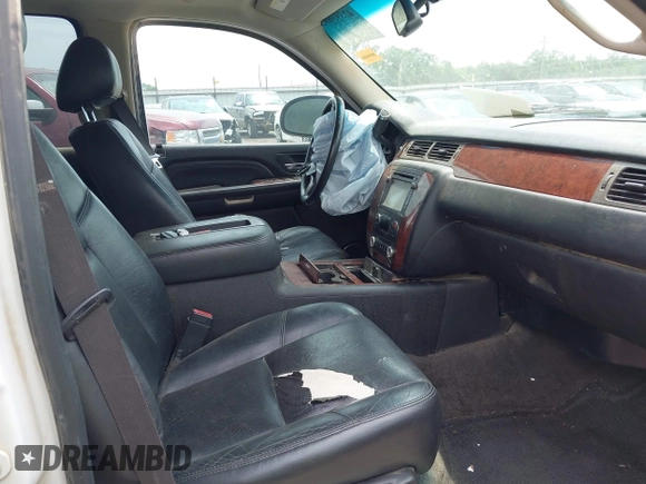 2012 Chevrolet Tahoe LTZ with VIN 1GNSCCE00CR197950, listed as a IAAI auction lot 42393693 with 296,161 mi miles and . Bid and sale history available at DreamBid. Image 5.