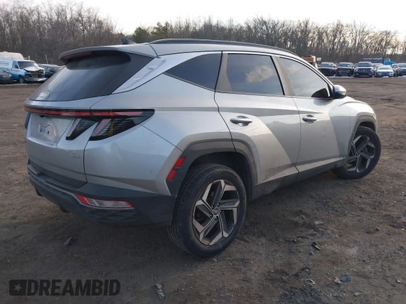 2022 Hyundai Tucson SEL with VIN 5NMJFCAE4NH060031, listed as a IAAI auction lot 41451874 with 57,228 mi miles and . Bid and sale history available at carsss.com. Image 4.