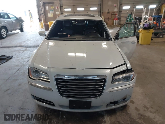 2014 Chrysler 300 with VIN 2C3CCAAGXEH217715, listed as a IAAI auction lot 41666179 with 145,744 mi miles and . Bid and sale history available at DreamBid. Image 12.