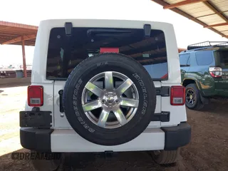 2016 Jeep Wrangler Unlimited Sahara with VIN 1C4BJWEG0GL126270, listed as a IAAI auction lot 42229364 with 50,847 mi miles and . Bid and sale history available at DreamBid. Image 16.