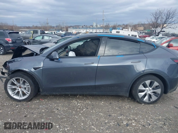 2023 Tesla Model Y Long Range with VIN 7SAYGDEE6PF824173, listed as a IAAI auction lot 41728613 with Not Provided miles and . Bid and sale history available at DreamBid. Image 14.