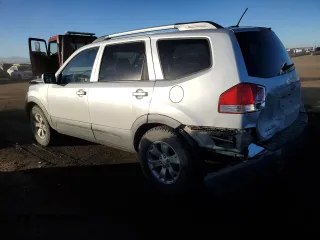 2009 Kia Borrego LX with VIN KNDJH741995032986, listed as a Copart auction lot 88787425 with 121,667 mi miles and Salvage Title. Bid and sale history available at carsss.com. Image 2.