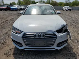 2018 Audi A4 Premium с VIN WAUDNAF41JA096443, выставлен на аукционе Copart как лот 55079265 с пробегом 125 294 миль миль и Списание • Salvage title. История ставок и продаж доступна на DreamBid. Изображение 5.