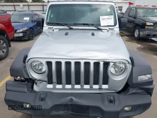 2023 Jeep Wrangler Sport with VIN 1C4HJXDG2PW508235, listed as a IAAI auction lot 42127823 with 25,069 mi miles and . Bid and sale history available at DreamBid. Image 12.