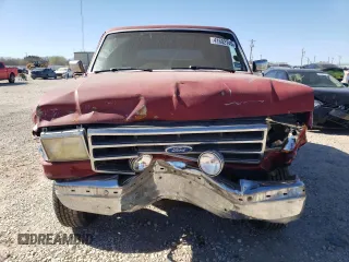1991 Ford Bronco XL with VIN 1FMEU15N1MLA21539, listed as a Copart auction lot 41602145 with 14,758 mi miles and Salvage Title. Bid and sale history available at carsss.com. Image 5.