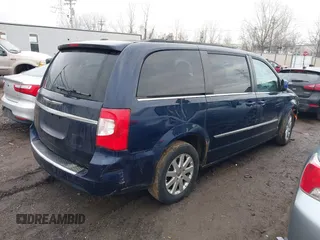 2013 Chrysler Town & Country Touring with VIN 2C4RC1BG9DR670205, listed as a IAAI auction lot 41683764 with 173,145 mi miles. Bid and sale history available at carsss.com. Image 4.
