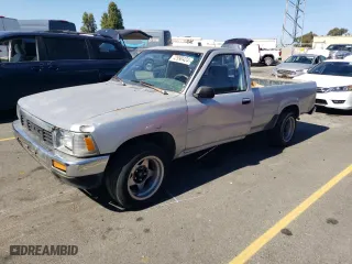 1989 Toyota 2WD Pickups DLX with VIN JT4RN82PXK0001791, listed as a Copart auction lot 72990424 with 168,369 mi miles and Salvage Title. Bid and sale history available at carsss.com. Image 1.