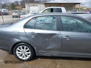 2010 Volkswagen Jetta SE with VIN 3VWRZ7AJ5AM162053, listed as a IAAI auction lot 41811153 with 141,988 mi miles and . Bid and sale history available at DreamBid. Image 6.