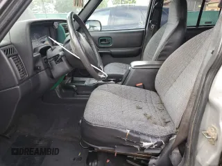 2000 Jeep Cherokee with VIN 1J4FF48S5YL172583, listed as a Copart auction lot 59605745 with 258,409 mi miles and Salvage title. Bid and sale history available at DreamBid. Image 7.