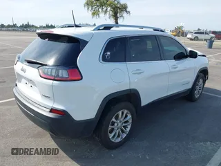 2019 Jeep Cherokee Latitude with VIN 1C4PJMCB5KD212940, listed as a IAAI auction lot 41762856 with 86,777 mi miles. Bid and sale history available at carsss.com. Image 4.