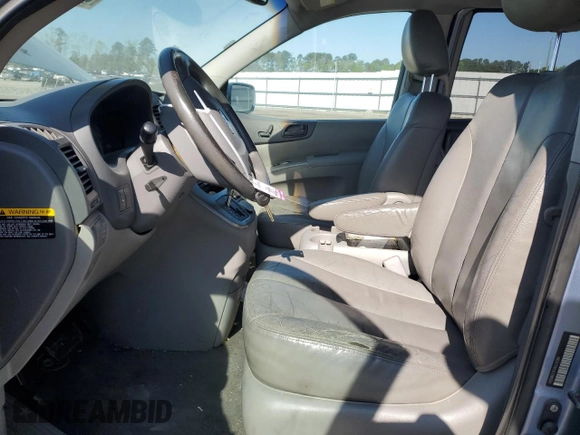 2008 Kia Sedona LX with VIN KNDMB233586210180, listed as a Copart auction lot 52090305 with 220,428 mi miles and Salvage Title. Bid and sale history available at carsss.com. Image 7.