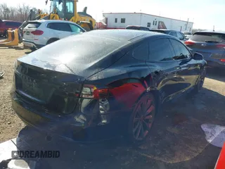 2014 Tesla Model S 60 with VIN 5YJSA1H1XEFP34226, listed as a IAAI auction lot 41806604 with 216,021 mi miles and . Bid and sale history available at DreamBid. Image 4.