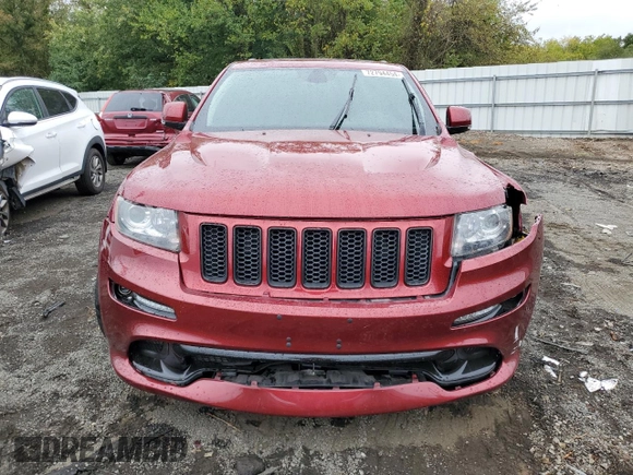 2012 Jeep Grand Cherokee SRT8 with VIN 1C4RJFDJ0CC351195, listed as a Copart auction lot 72794454 with 104,672 mi miles and Salvage Title. Bid and sale history available at carsss.com. Image 5.