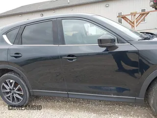 2018 Mazda CX-5 Grand Touring with VIN JM3KFBDM3J0384431, listed as a IAAI auction lot 42013474 with 65,018 mi miles. Bid and sale history available at carsss.com. Image 13.