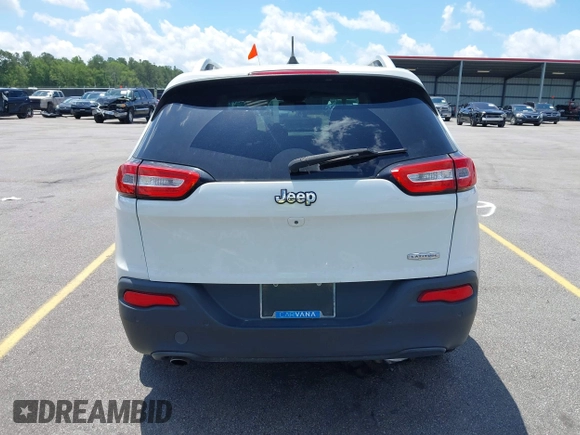 2016 Jeep Cherokee Latitude with VIN 1C4PJLCB0GW291357, listed as a IAAI auction lot 42312356 with 105,692 mi miles and . Bid and sale history available at DreamBid. Image 17.